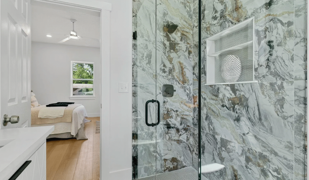 Luxury bathroom interior designed by Jacksonville custom home builder Dream Home Builders & Roofing Inc.